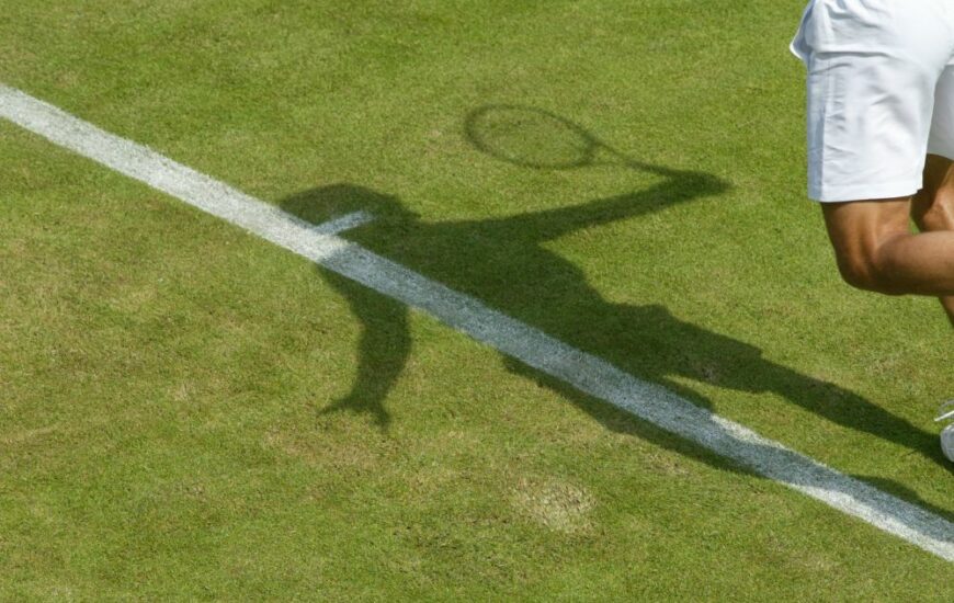 The shadow of a Wimbledon tennis player
