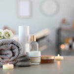 candles and a towel in a spa